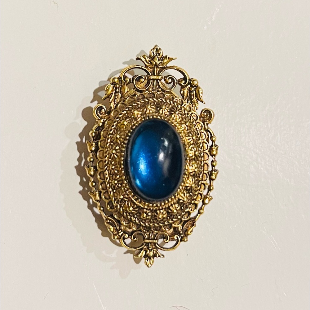 Vintage gold tone Arthur Pepper brooch,scarf clip blue cabochon